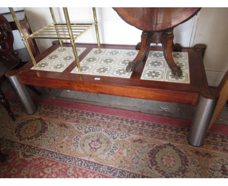 Large Scandinavian mahogany tile inset coffee table on heavy cylindrical metal supports 