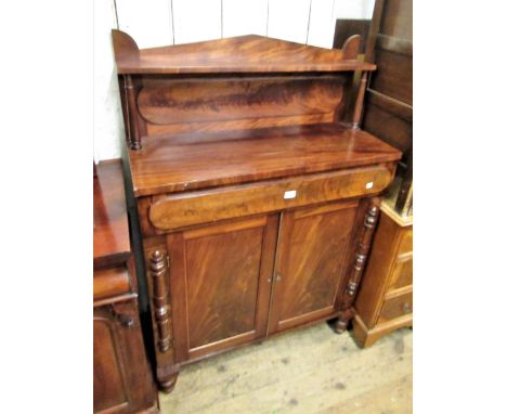 Victorian figured mahogany chiffonier, the shelf back above a single drawer and two figured panel doors flanked by split balu