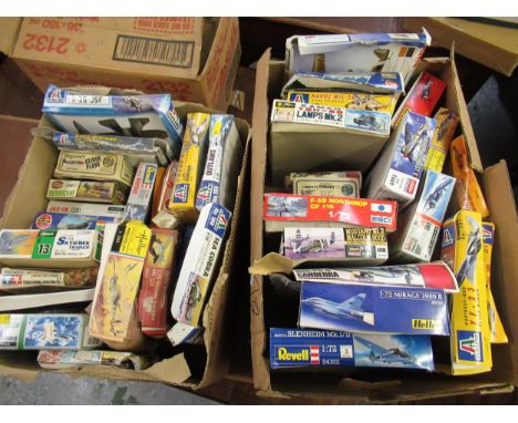 Two boxes containing thirty nine unmade plastic aircraft kits including Airfix, Italeri, Ravel and Esci 