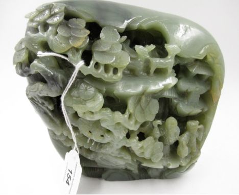 Large 20th Century mottled green jade carving of figures in a landscape, 15cm x 16cm approximately 