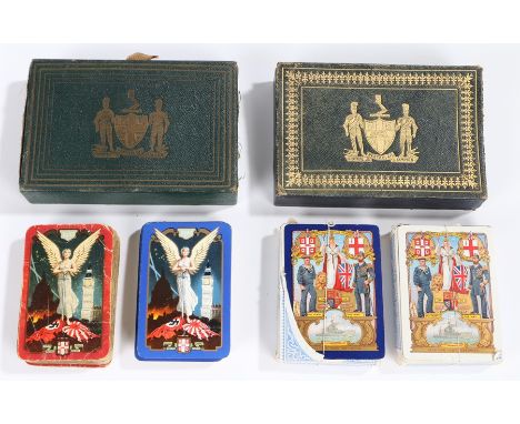 Two leather and gilt tooled playing card cases, with the Latin script under a crest Corde Recto Elati Omnes, containing playi