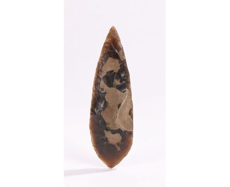 Neolithic flint axe head, napped example with tapering sharp body, 13cm long. Found in Suffolk during the 1960's by a farm wo