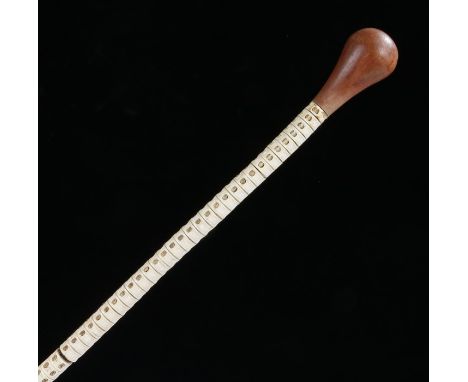 19th Century shark vertebrae walking stick, the a turned finial above the vertebrae, 82cm long 