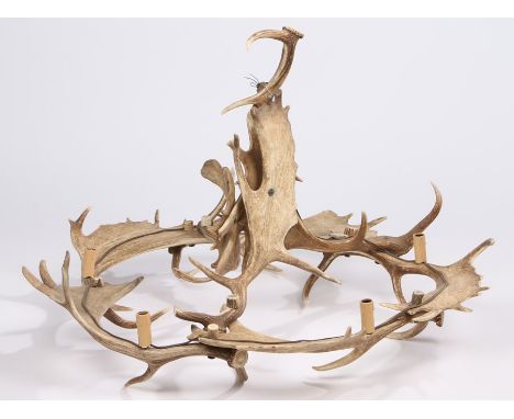 Large stag antler chandelier, with eight antlers forming the body, 103cm wide