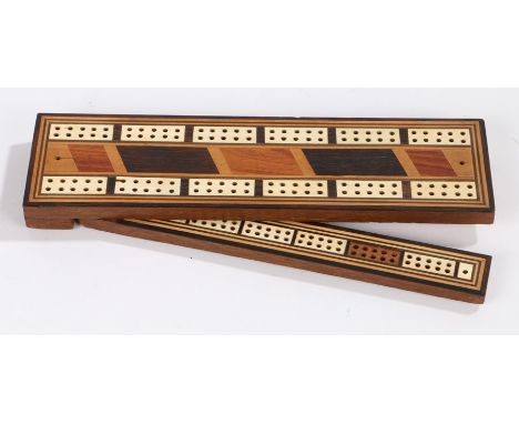 19th Century marquetry inlaid cribbage board, with folding concealed side arm and compartment containing four turned ivory pe