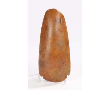 Neolithic polished flint axe head, with a deep tapering body, 16cm long. Found in Suffolk during the 1960's by a farm worker 