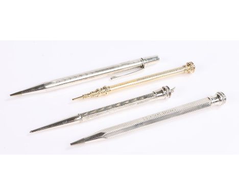 Three white metal pencils with engine turned bodies, gilt metal pencil with engine turned body and seal top (4)