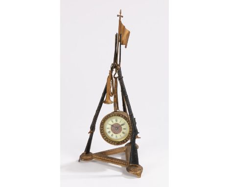 Desk clock, the frame in the form of three rifles with hanging bugle and clock in the form of a drum to the centre, the ivory