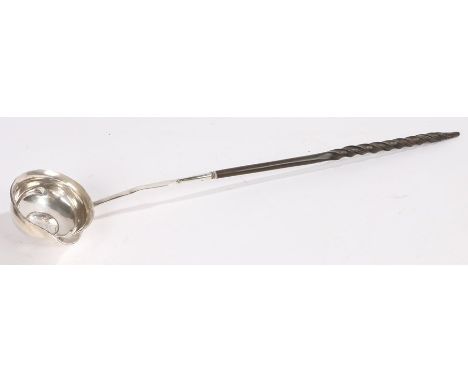 George III toddy ladle, with a coin set to the bowl and attached to the baleen handle, 37cm long