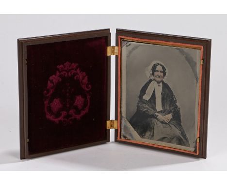 19th Century Half Plate ambrotype, of a seated elderly lady, set into a Union case manufactured by S. Peck &amp; Co