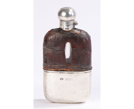 Victorian hip flask, with a silver hinged top assayed for London 1899 above a crocodile skin cover and silver push on cup, 16