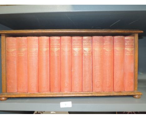 An small oak book shelf and vintage volumes