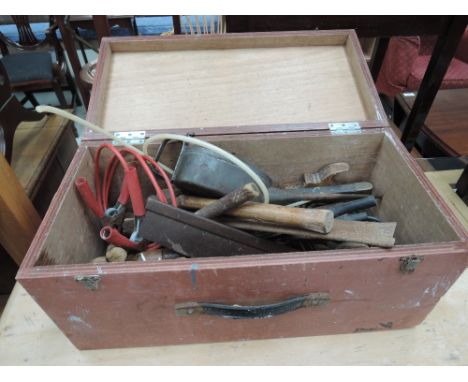 A small tool box and vintage tools