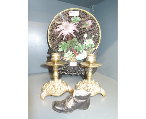 A 20th century cloisonne plate having Peony decoration on stand and a pair of cast brass candlestick, having mask decoratiion