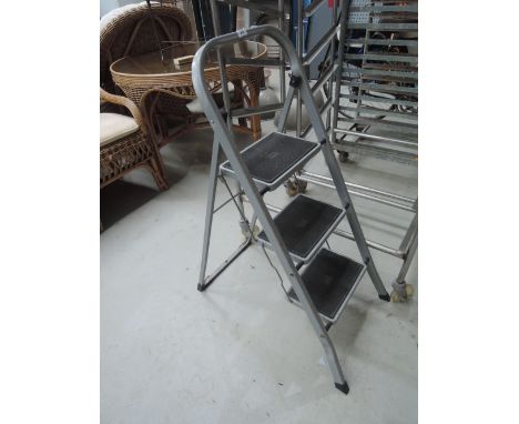 A pair of small size step ladders