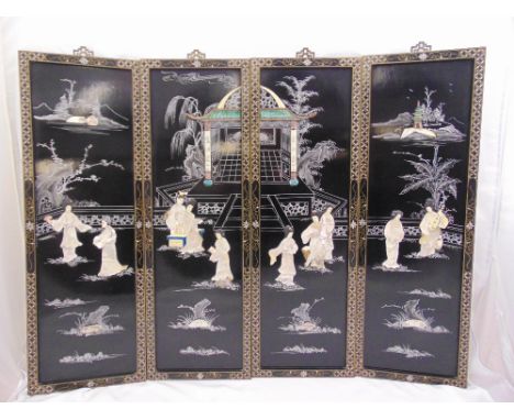 A set of four Chinese ebonised wall panels depicting exterior scenes inlaid with mother of pearl and soapstone, each panel 91
