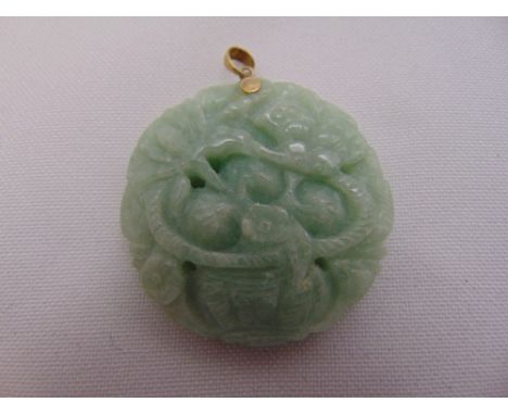 A Chinese carved jade with a 14ct yellow gold pendant fitting