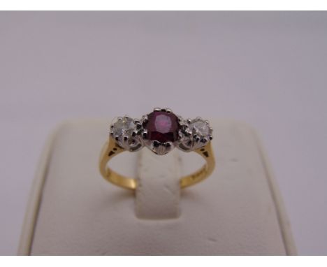 18ct gold, ruby and diamond three stone ring, approx total weight 3.3g