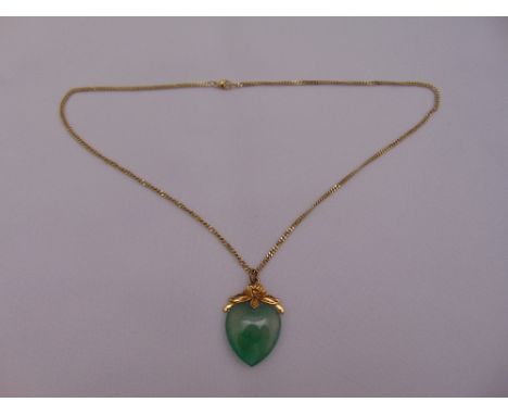 9ct yellow gold and jade heart shaped pendant on a 9ct yellow gold chain, approx total weight 14.6g (chain approx total weigh