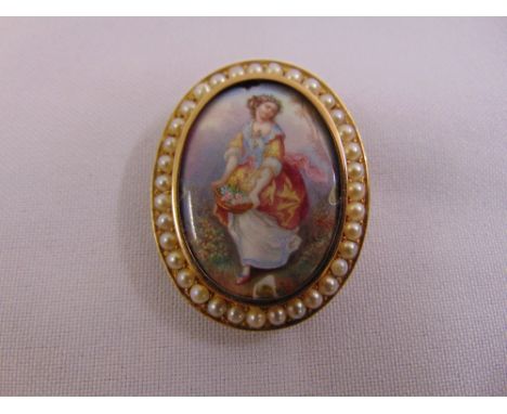 A Victorian seed pearl and enamel brooch tested 10ct