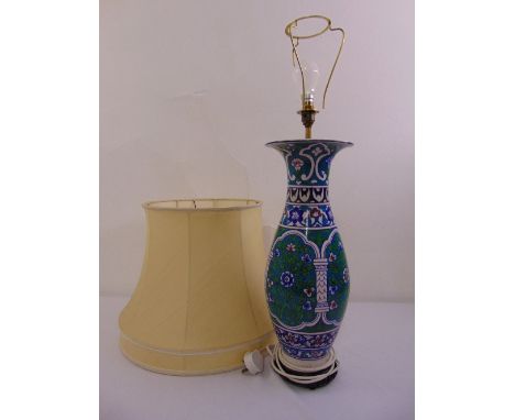 A Chinese baluster vase decorated with flowers and scrolls table lamp on a carved hardwood stand to include a silk shade, 55.