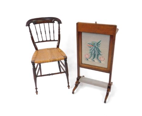 A Victorian mahogany and armorial tapestry firescreen, 81cm H, 42cm W, together with a Regency faux rosewood bedroom chair. (