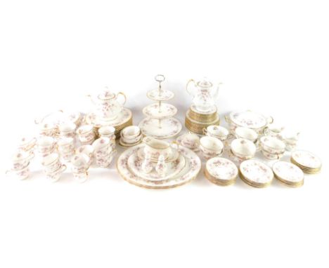 A Paragon porcelain dinner tea and coffee service decorated in the Victoriana Rose pattern, comprising a pair of oval meat pl