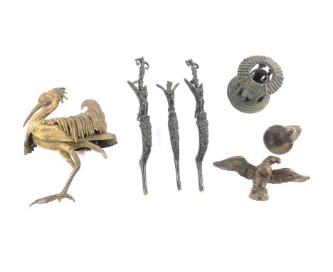 A late 19thC Continental ormolu figure of a heron, modelled in standing pose, (AF), a metal lid with cast dove finial, a bras