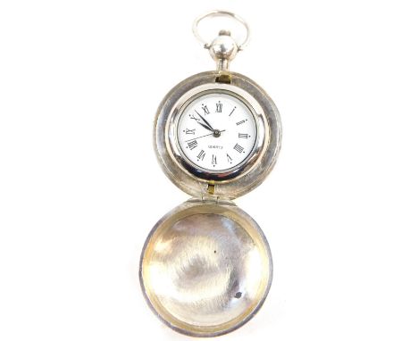 A lady's silver hunter pocket watch, removable watch with white dial bearing Roman numerals, Quartz movement, the case of pla