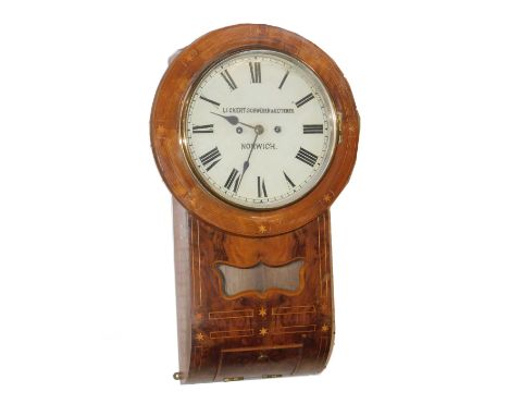 A Victorian walnut cased drop dial wall clock by Lickert Schwerer &amp; Ketterer of Norwich, circular enamel dial bearing Rom