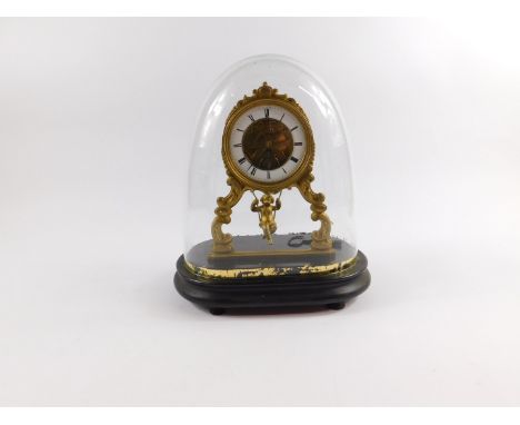A late 19thC French gilt metal mantel clock, with visible escapement, enamel chapter ring bearing Roman numerals, movement ma