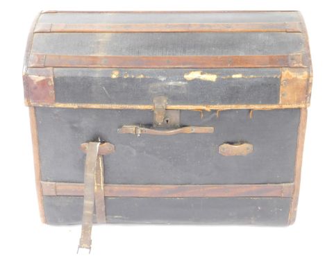 A Victorian leather and wooden bound domed trunk, with leather carrying handles, initialled to side MGP, 65cm H, 83cm W, 56cm