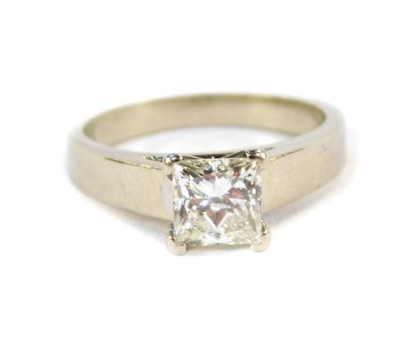 A diamond solitaire ring, set with a princess cut diamond, measuring 5.9mm x 5.92mm, total carat weight 1.2cts, in four corne
