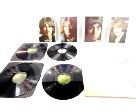 A Beatles White Album first press, No 0349364, and a later White Album. (2)