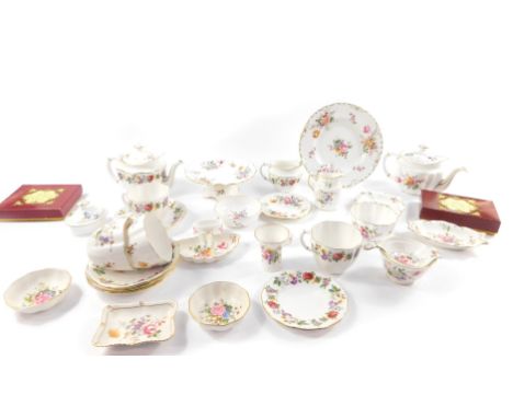 A group of Royal Crown Derby porcelain decorated in the Derby Posies pattern, including teapots, cream jugs, tea strainer, cu