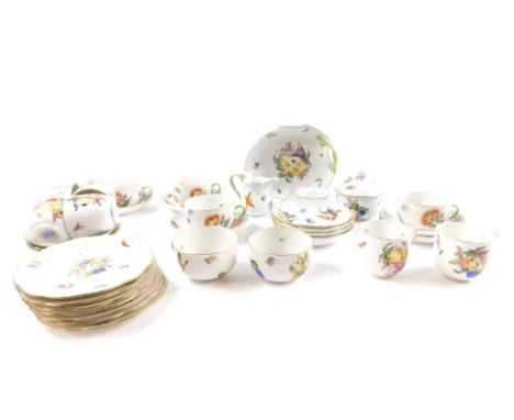 A Herend porcelain part tea and coffee service, painted with fruit and flowers, pattern no 1726, comprising six tea cups and 