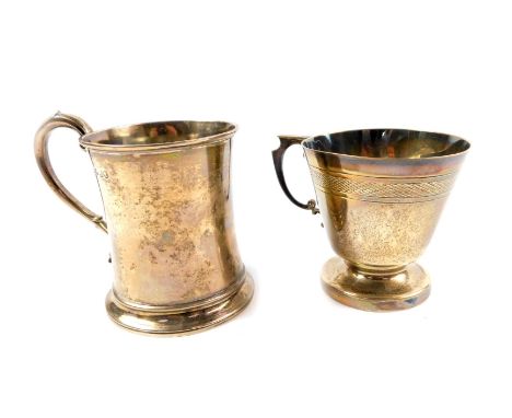 A Victorian silver tankard, monogram engraved, Richard Pearce, London 1859, and a further silver tankard, with an engine turn