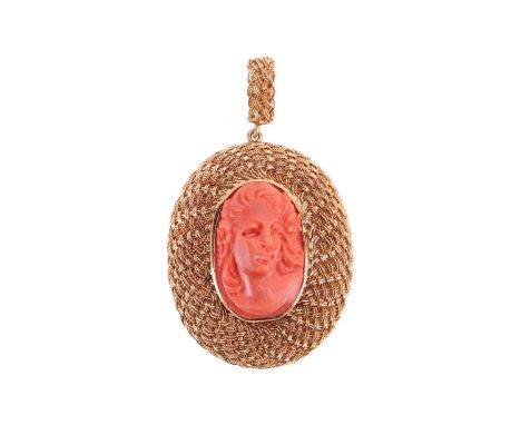 A 19th century carved coral pendant, depicting a profile portrait of a maiden, bezel set in a later yellow metal woven surrou