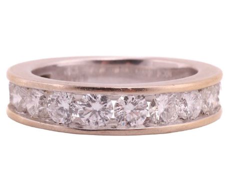 A diamond half-eternity ring in 18ct gold, channel-set with thirteen graduated round brilliant-cut diamonds, with an estimate