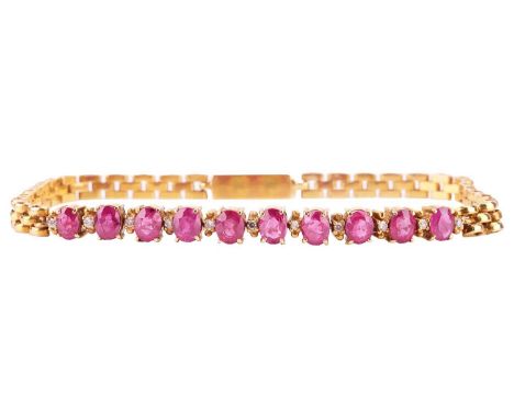 A ruby and diamond line bracelet; composed of ten oval-cut rubies interspaced with eleven round brilliant cut diamonds in cla