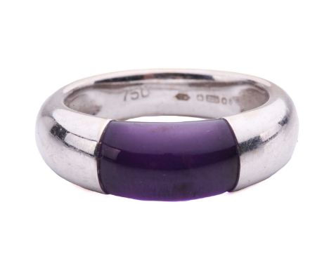 An amethyst dress ring in 18ct white gold, the polished amethyst set in a closed-back integrated D-section shank, London hall