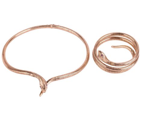 A serpent bracelet and necklace suite. The coiled snake bracelet is coiled around an internal steel spring; to a plain taperi