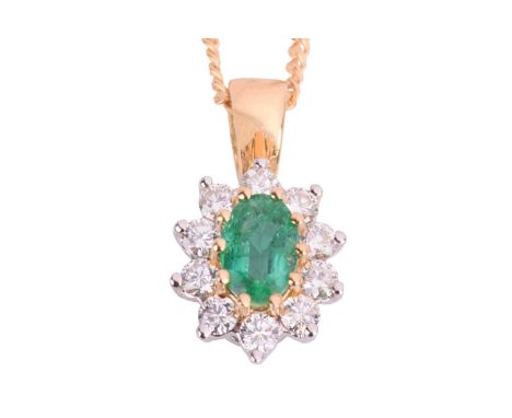 An emerald and diamond cluster pendant on chain, the treated oval emerald is claw set within a surround set with ten round br