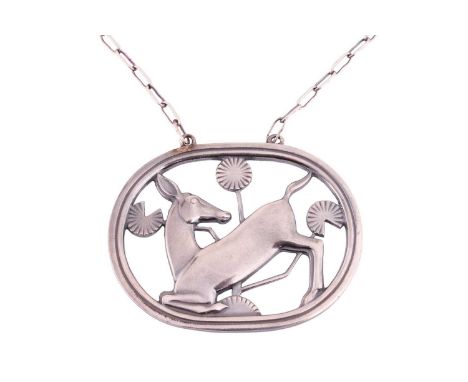 Georg Jensen - a necklace with kneeling fawn and flowers, attached to a cable chain and toggle clasp, designed by Arno Malino