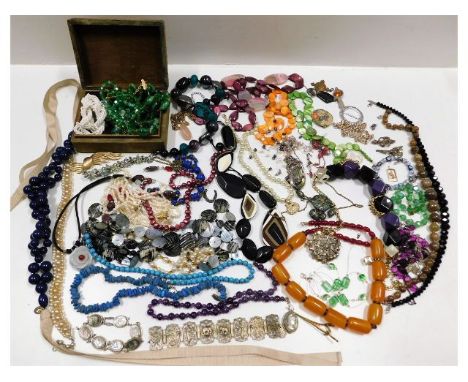 A quantity of vintage costume jewellery including some silver items