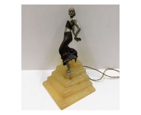 An art deco period figurative lamp with spelter flamenco dancer on opaque lucite style steps, 14in tall x 7.5in square at bas