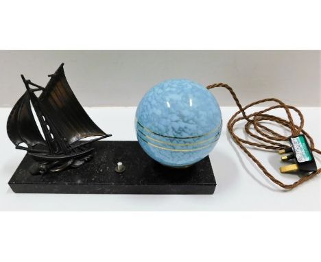 An art deco style lamp with sailboat decor 10in wide x 5in high