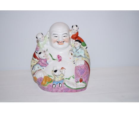 Smiling ceramic Buddha with children Height 24 cm