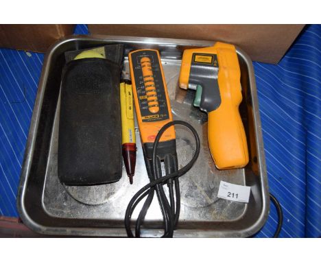 Tray containing a Fluke infra-red thermometer, electrical tester and a voltage detector