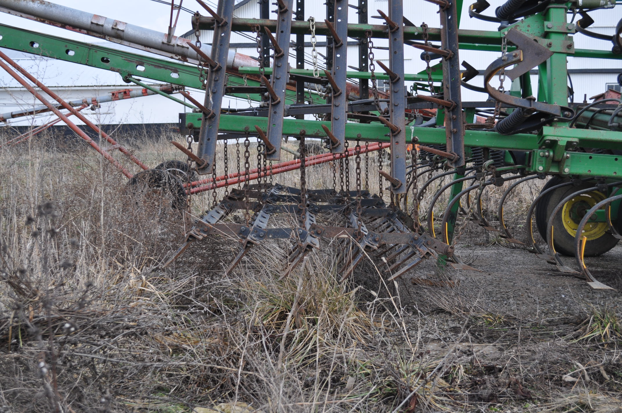 25' John Deere Field cultivator, spring shank, new sweeps, poly shank